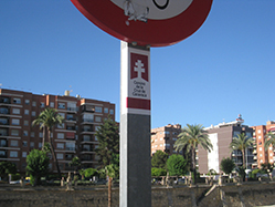 Adhesive vinyl on a street lamp or metal element